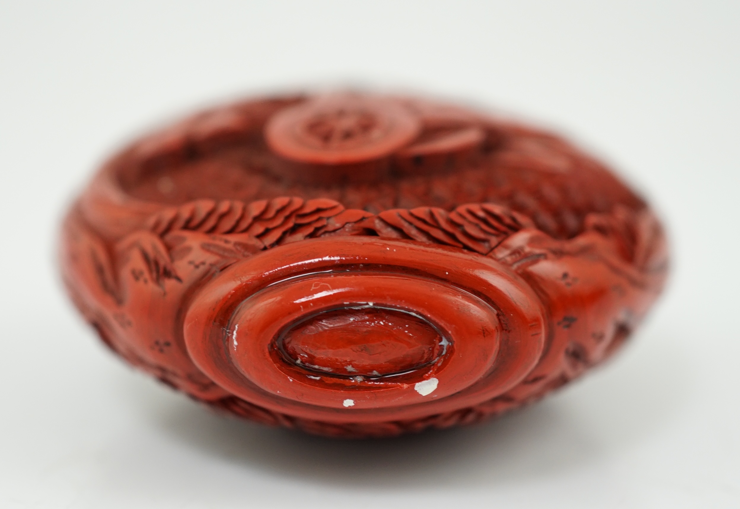 A Chinese cinnabar lacquer snuff bottle, 19th century, minor damage